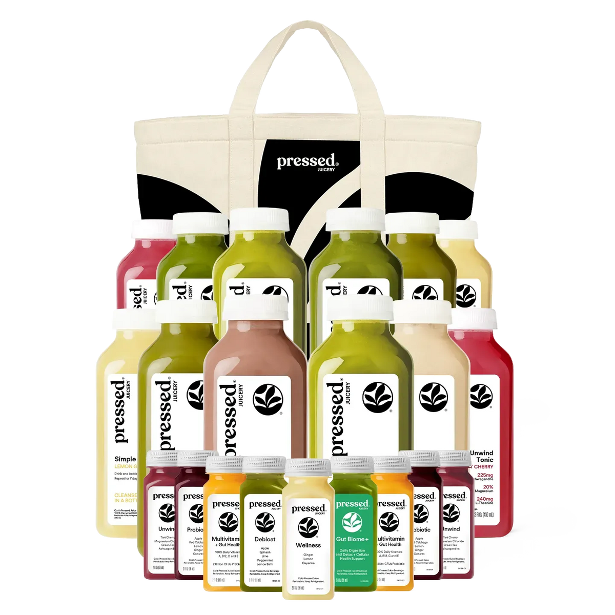 Assorted 'pressed' juice bottles in a tote bag on a white background