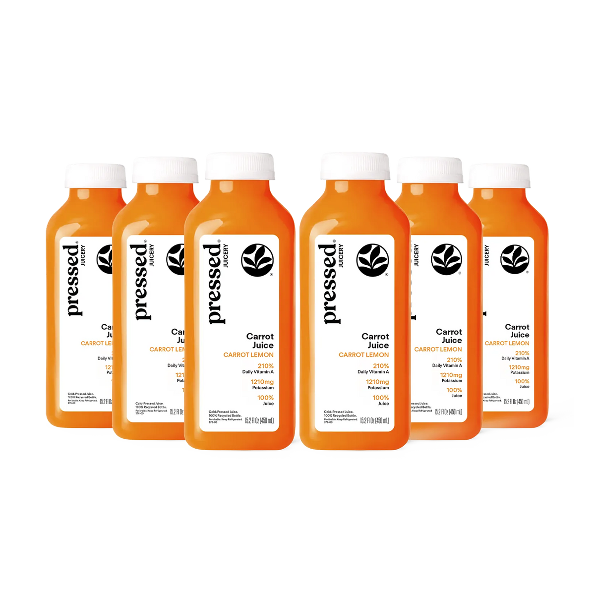 Six bottles of Pressed Carrot Juice arranged in a staggered row on a white background. The bottles are filled with bright orange juice and have white caps with white labels featuring black text and a leaf logo.