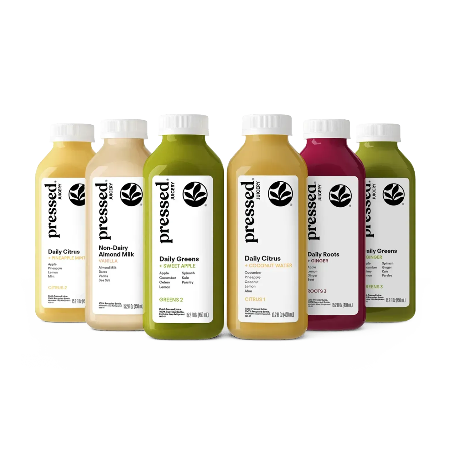 Six bottles of Pressed Juice non-almond beverages arranged in a row against a white background. The bottles contain yellow, beige, green, orange-yellow, magenta, and green liquids, with white caps and white labels featuring the black 'pressed juice' brand name.