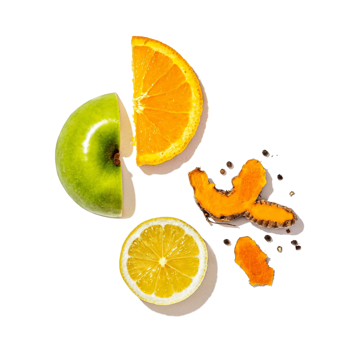 Sliced fruits including an apple, orange, and lemon on a transparent background