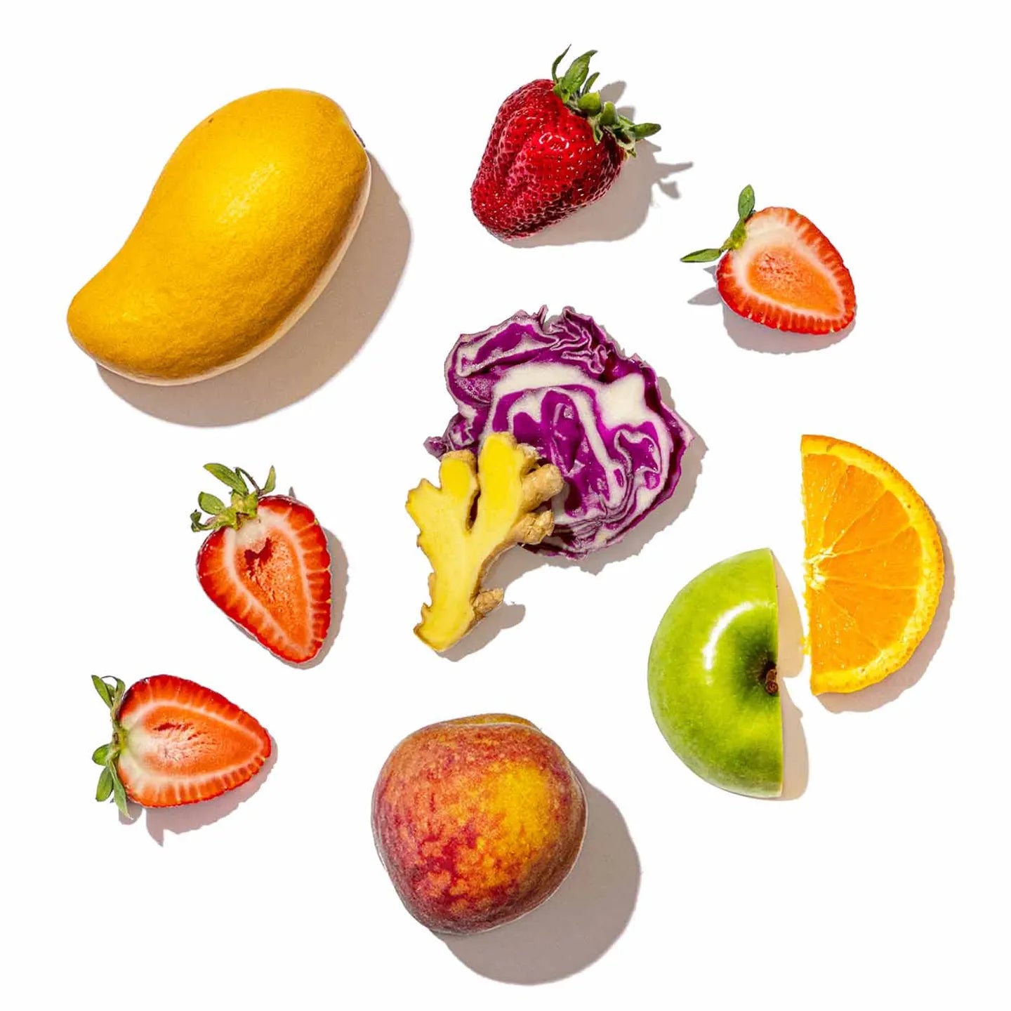 Assorted fruits and vegetables on a white background