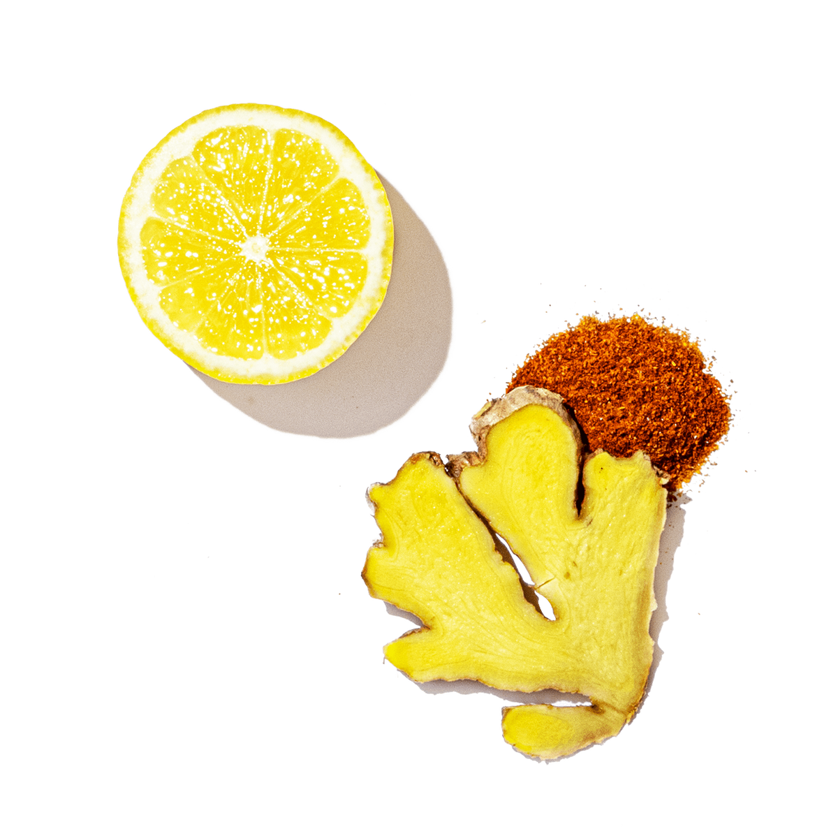 Sliced lemon and piece of ginger on a transparent background