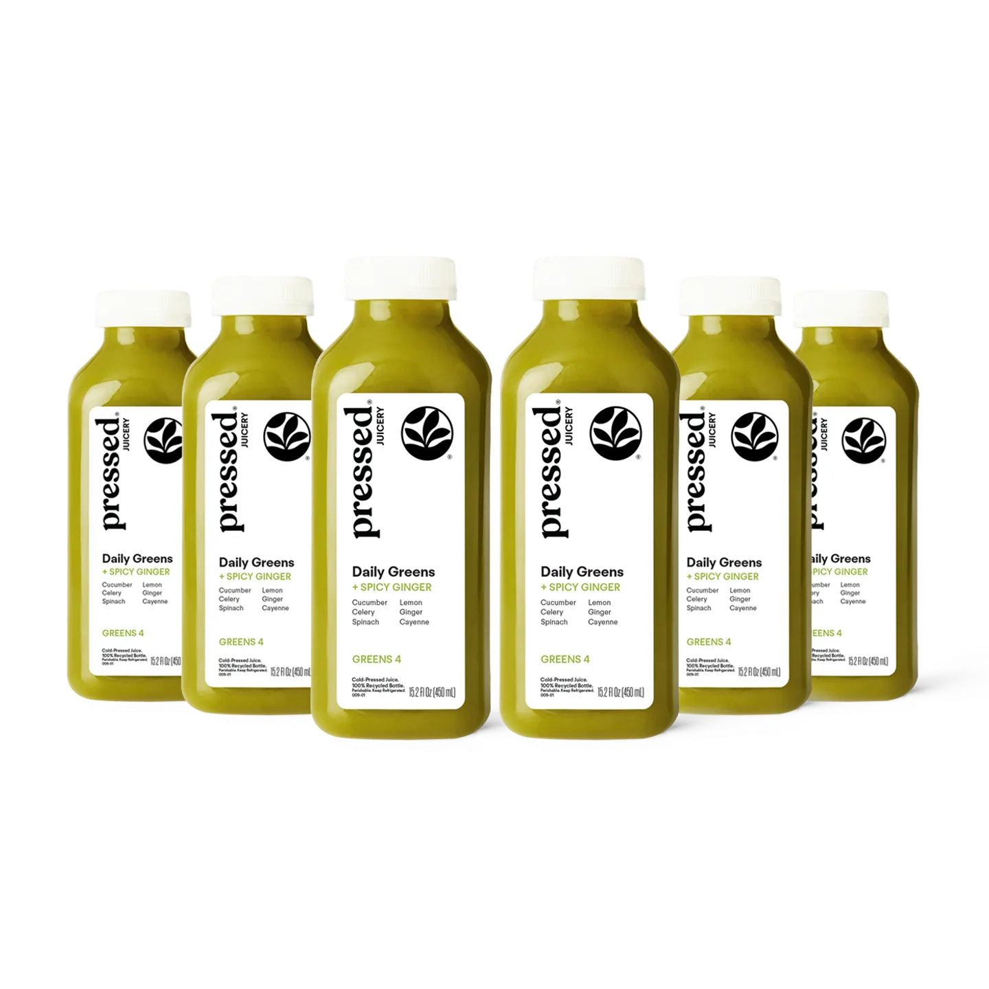 Bottles of 'pressed' Daily Greens juice on a white background