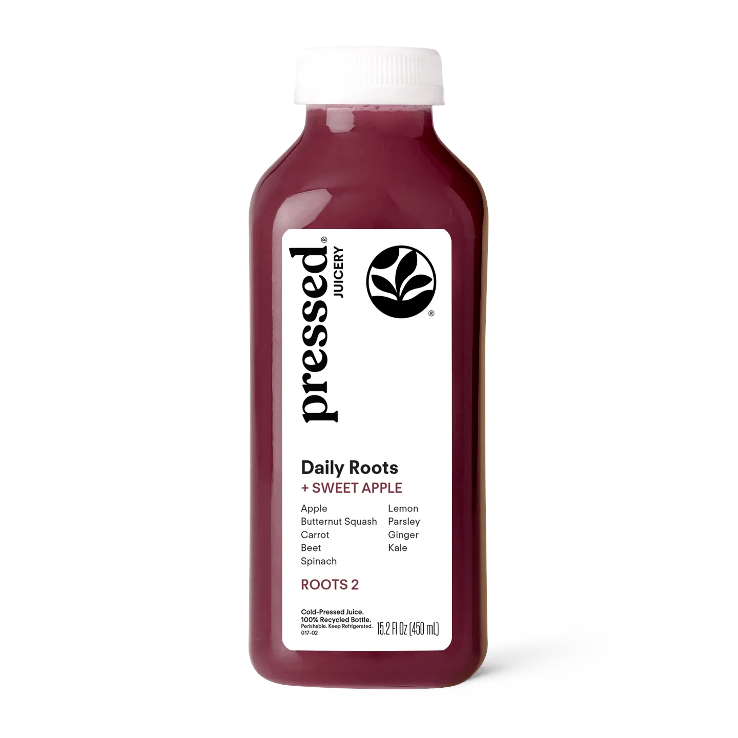 Bottle of pressed Juicery Daily Roots + Sweet Apple juice on a white background