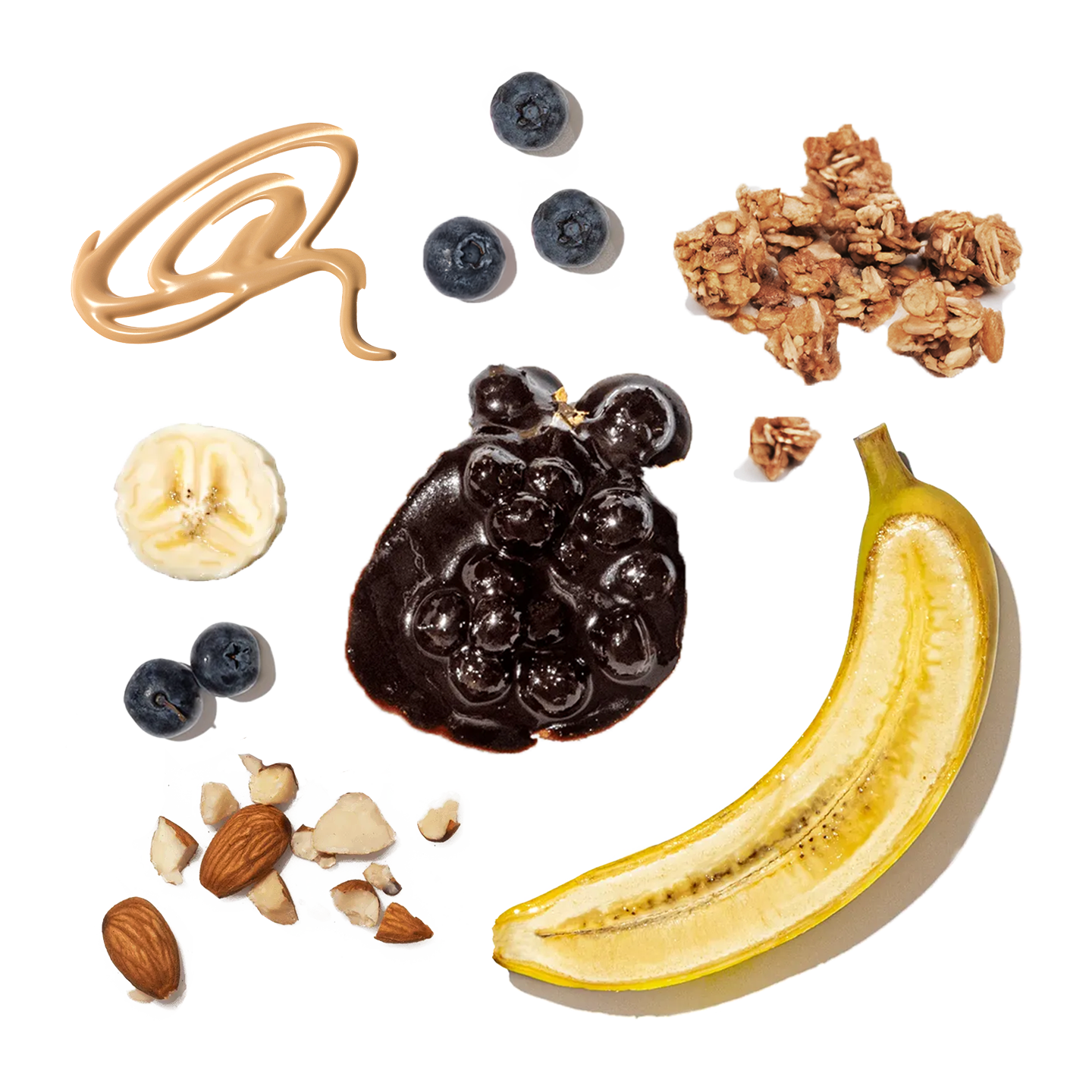 Ingredients for a snack including peanut butter, blueberries, granola, banana, and nuts on a white background.