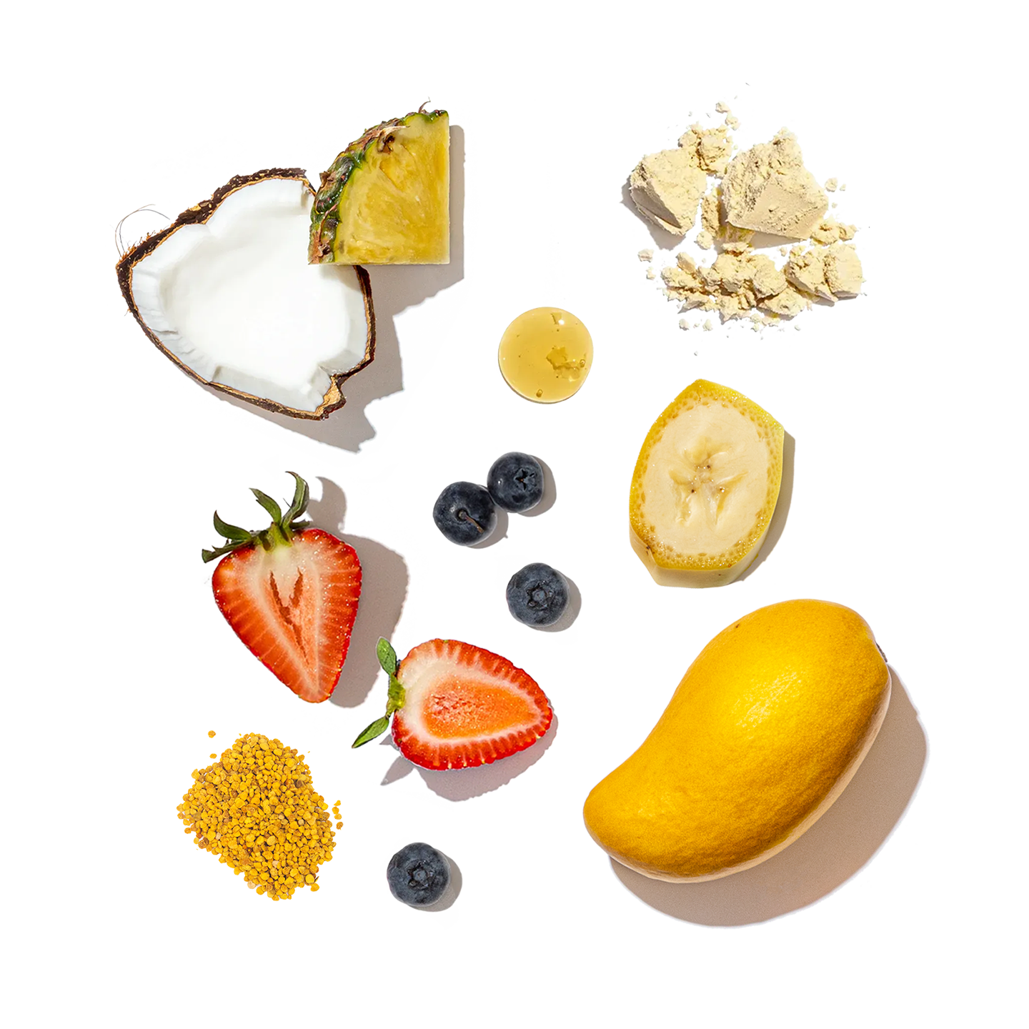 Assorted fruits and a bowl of yogurt on a white background