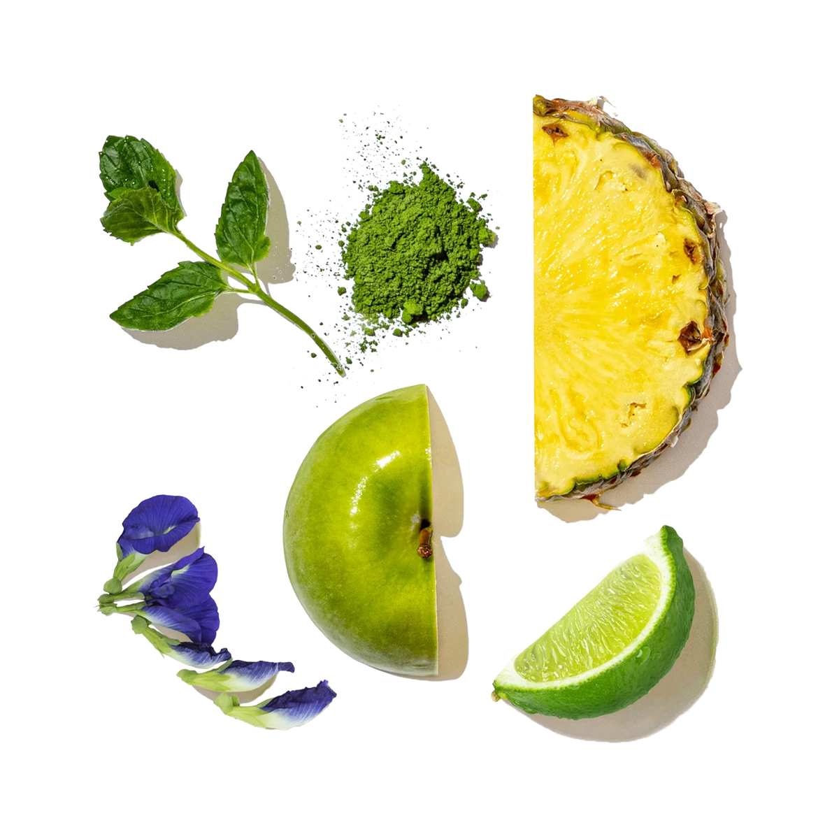 Collage of green fruits and vegetables including a pineapple, apple, lime, and mint leaves on a white background.