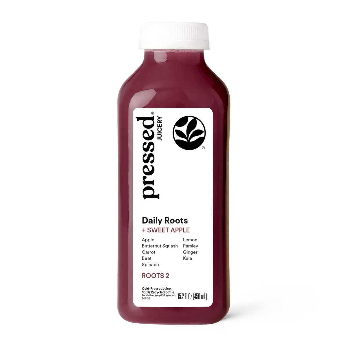 Bottle of pressed Juicery Daily Roots + Sweet Apple juice on a white background