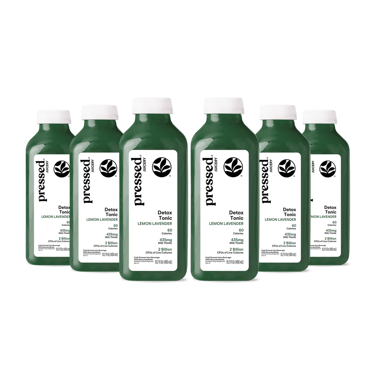 Multiple bottles of 'pressed' Detox Tonic on a white background
