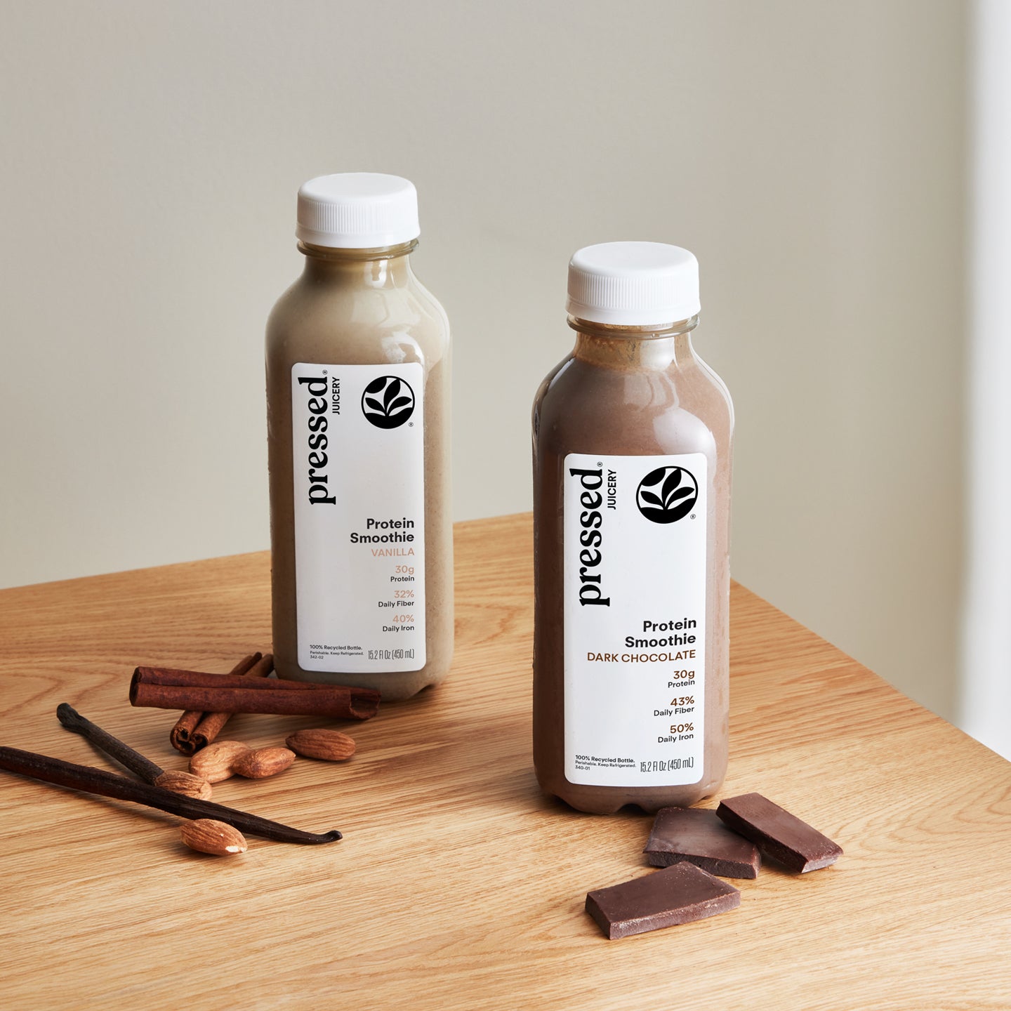 Pressed Juicery High Protein Smoothie Variety Pack featuring Vanilla and Dark Chocolate 30g plant-based protein smoothies with vanilla, almonds, cinnamon and chocolate.