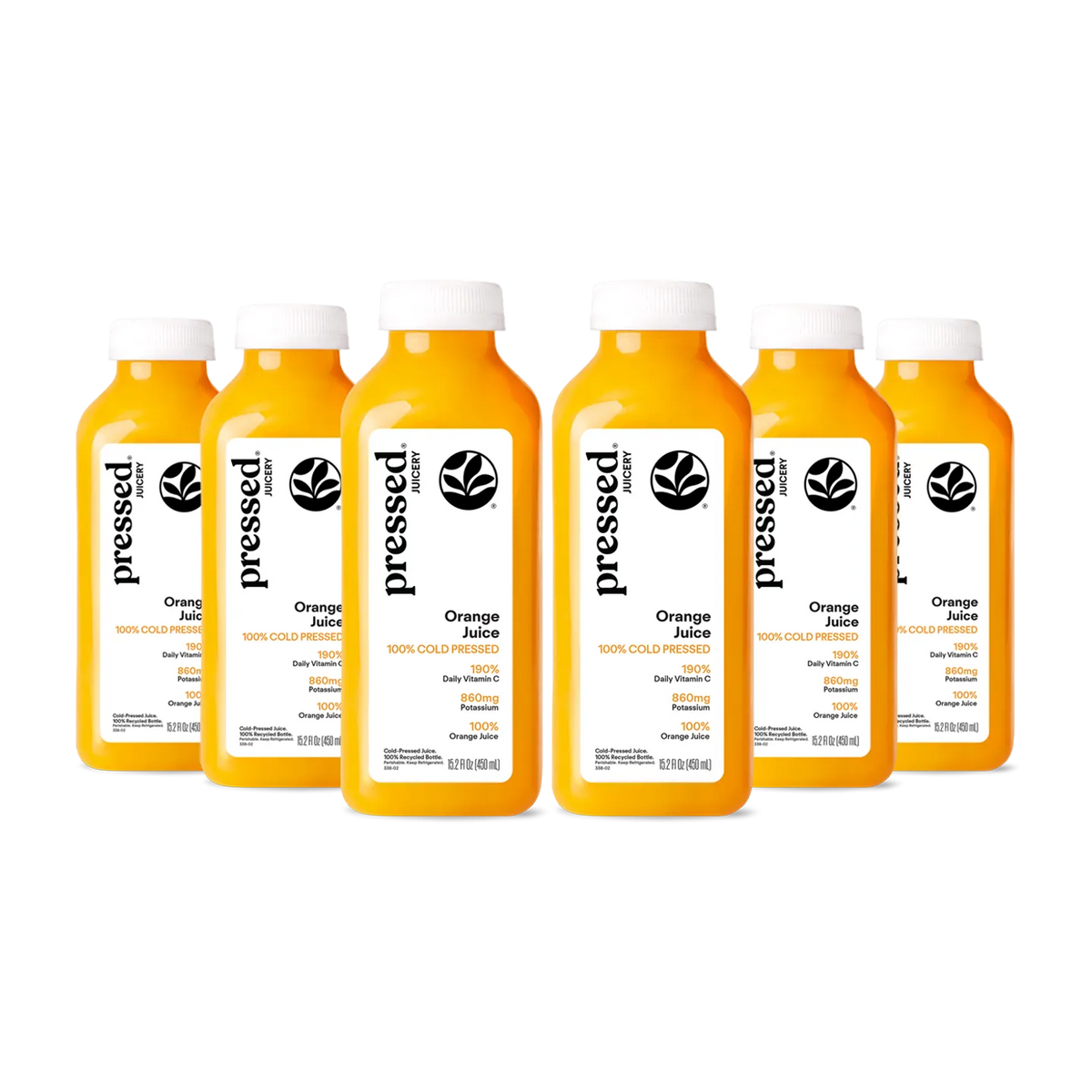 Bottles of pressed orange juice with white caps on a white background