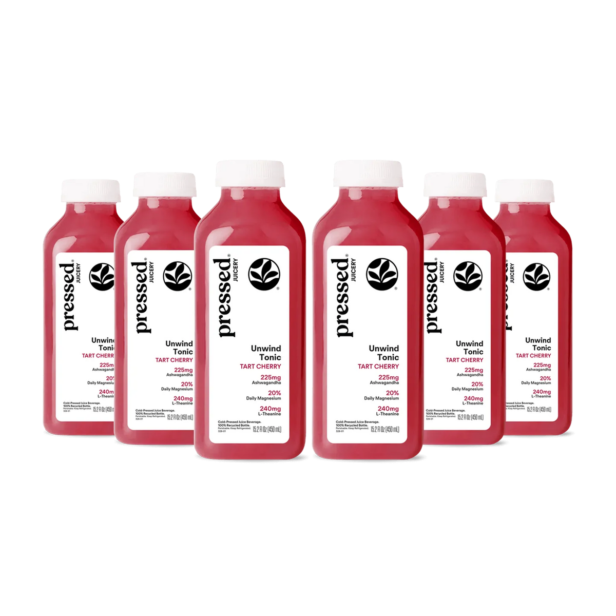 Multiple bottles of 'pressed' brand tart cherry juice on a white background