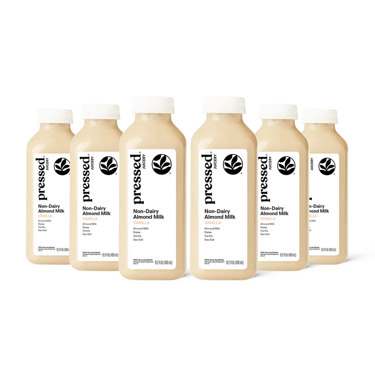 Multiple bottles of pressed brand non-dairy almond milk on a white background