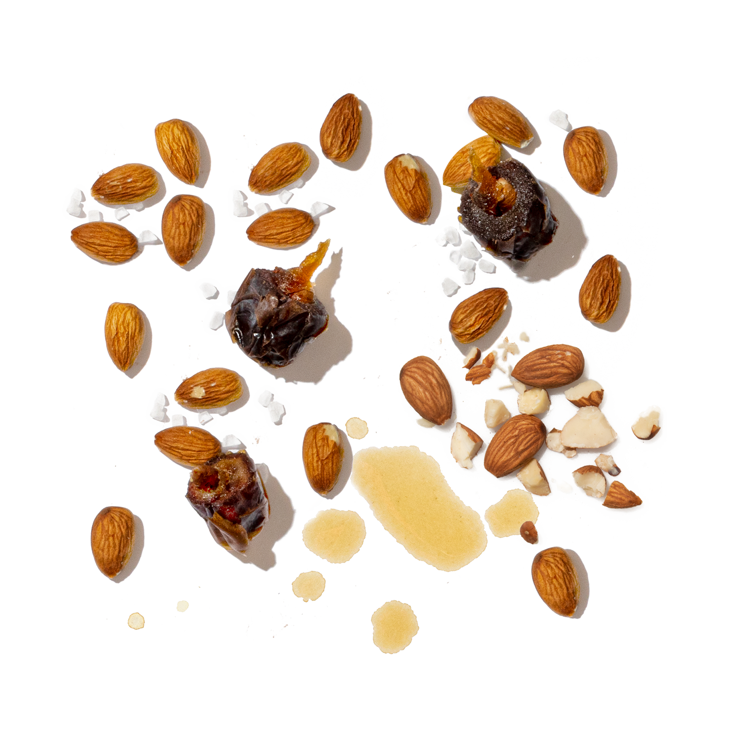 Assorted nuts and dried fruits on a white background