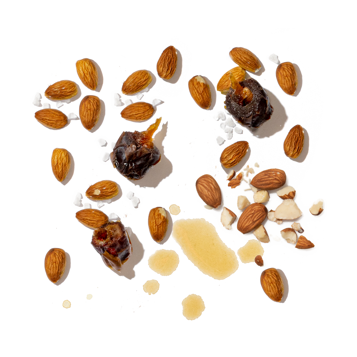 Assorted nuts and dried fruits on a white background