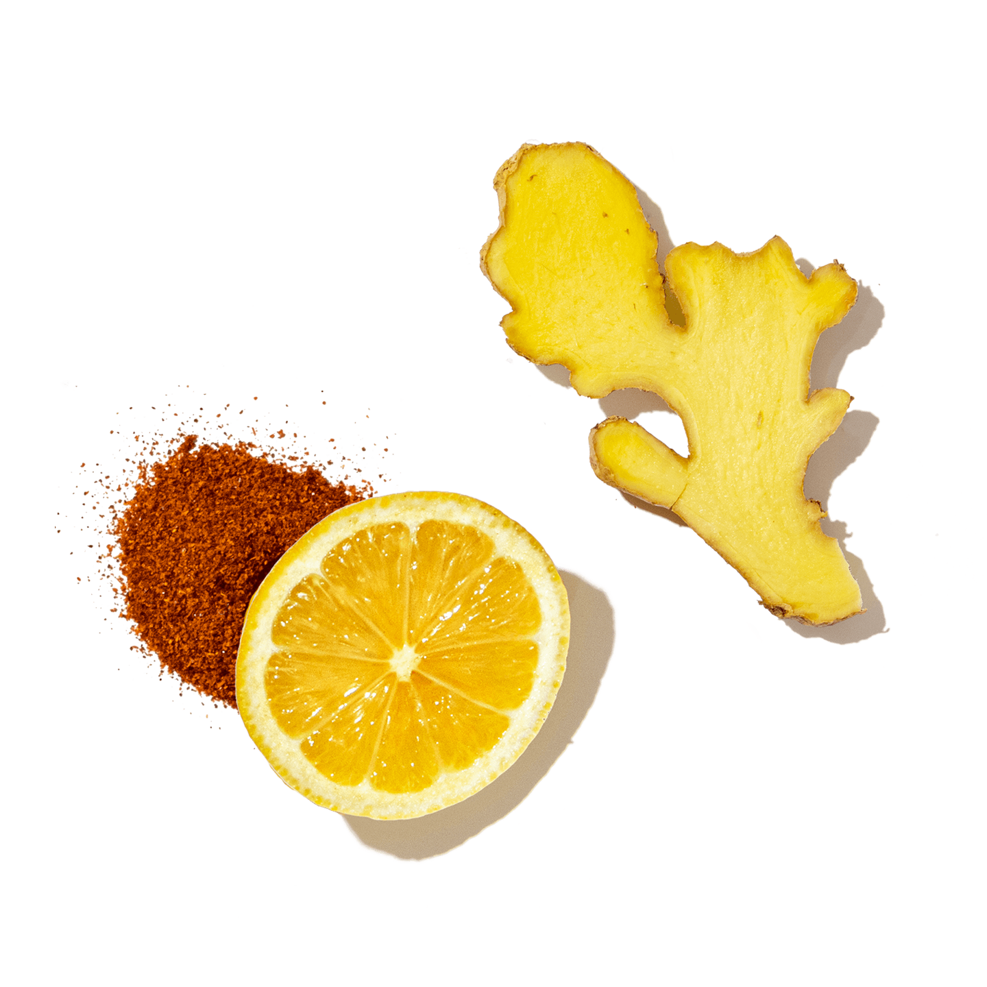 Ginger root, lemon, and cinnamon on a transparent background