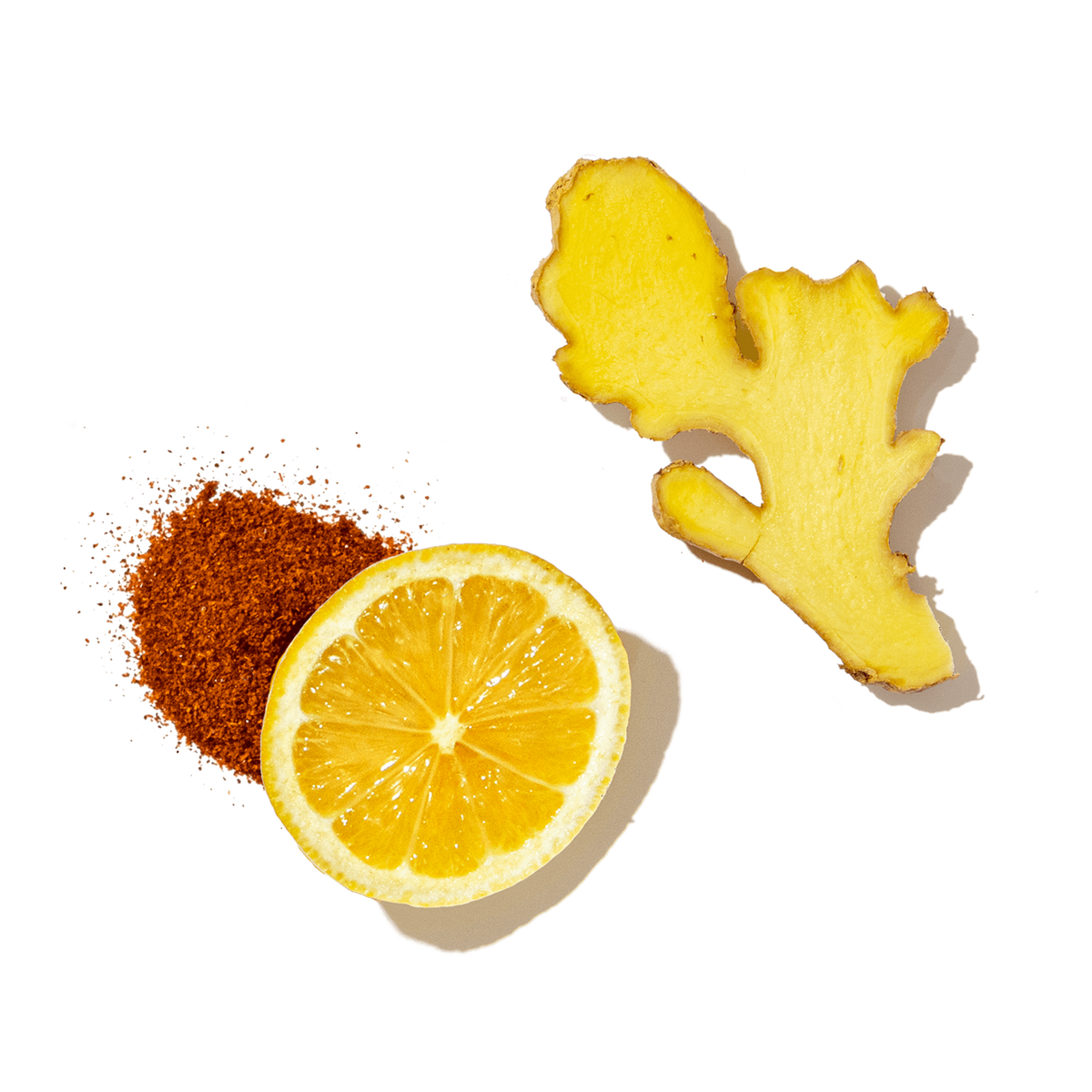 Ginger root, lemon, and cayenne pepper on a transparent background